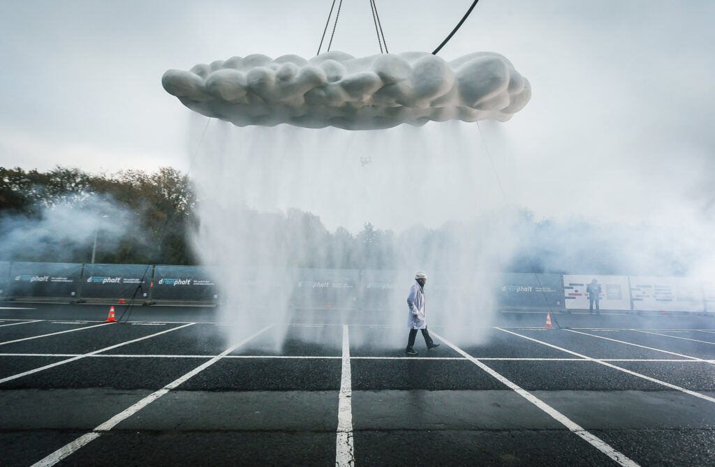 June20: Drainphalt - The Cloud Project, cloud raining on pavement