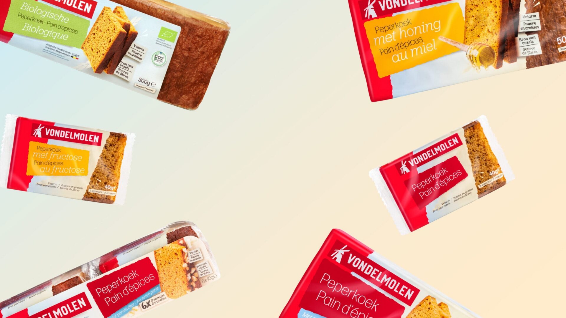 Vondelmolen peperkoek producten — verschillende verpakkingen biologisch, met honing en pain d'épices op lichte achtergrond